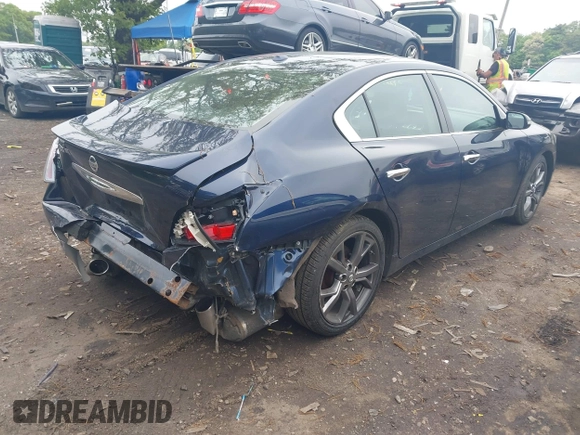 2014 Nissan Maxima SV with VIN 1N4AA5AP9EC451594, listed as a IAAI auction lot 42276826 with 130,372 mi miles and . Bid and sale history available at DreamBid. Image 4.