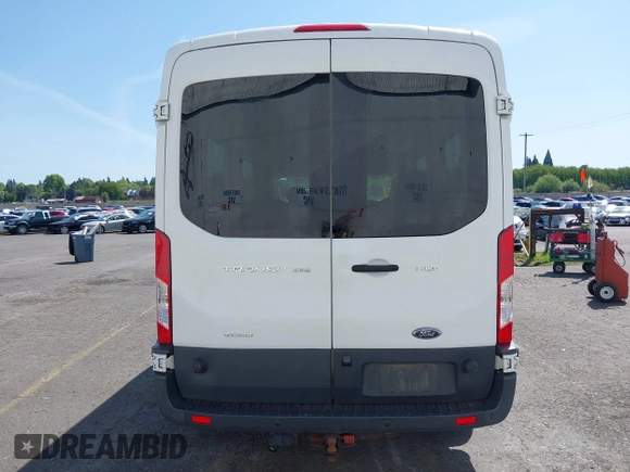 2015 Ford Transit Passenger XL z VIN 1FBAX2CG7FKA75719, wystawiony jako IAAI lot #42135118 z przebiegiem Nie podano mil oraz . Historia ofert i sprzedaży dostępna na DreamBid. Obrazek 16.
