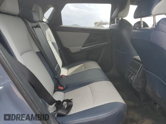 2023 Subaru Solterra Limited with VIN JTMABABA4PA031170, listed as a Copart auction lot 54517985 with 53,221 mi miles and Salvage title. Bid and sale history available at DreamBid. Image 11.