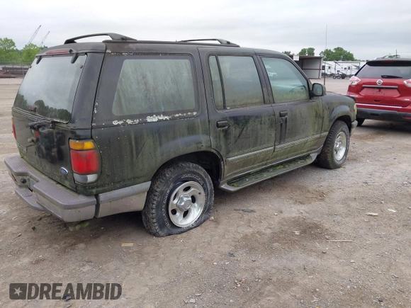 1996 Ford Explorer XL with VIN 1FMDU34X7TZB67613, listed as a IAAI auction lot 42513644 with 169,502 mi miles and . Bid and sale history available at DreamBid. Image 4.