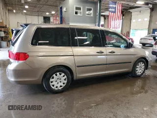 2009 Honda Odyssey LX with VIN 5FNRL38259B018546, listed as a Copart auction lot 62142015 with 162,459 mi miles and Salvage title. Bid and sale history available at DreamBid. Image 3.
