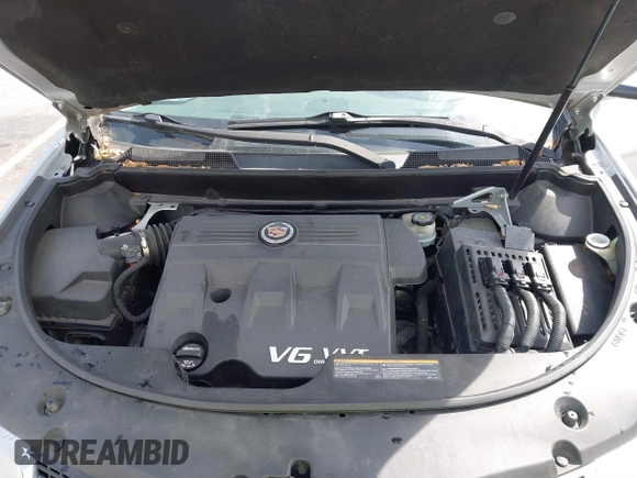 2013 Cadillac SRX Luxury Collection with VIN 3GYFNCE39DS512235, listed as a IAAI auction lot 38873243 with 133,378 mi miles and . Bid and sale history available at DreamBid. Image 10.
