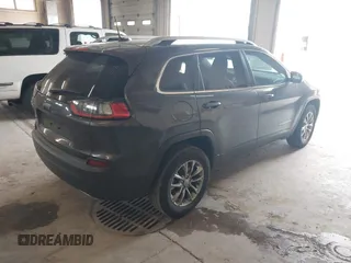 2020 Jeep Cherokee Altitude z VIN 1C4PJMLX9LD644816, wystawiony jako IAAI lot #42400461 z przebiegiem 32 235 mil mil oraz . Historia ofert i sprzedaży dostępna na DreamBid. Obrazek 4.