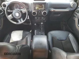 2016 Jeep Wrangler Unlimited Sahara with VIN 1C4BJWEG6GL212733, listed as a Copart auction lot 62664445 with 114,004 mi miles and Salvage title. Bid and sale history available at DreamBid. Image 8.