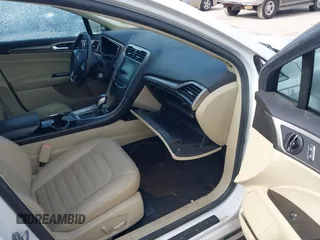 2014 Ford Fusion SE with VIN 3FA6P0HD8ER169211, listed as a IAAI auction lot 42038877 with 215,769 mi miles. Bid and sale history available at carsss.com. Image 5.