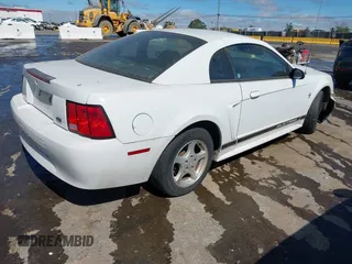 2002 Ford Mustang Standard with VIN 1FAFP40462F119838, listed as a IAAI auction lot 42801101 with Not provided miles and . Bid and sale history available at DreamBid. Image 4.