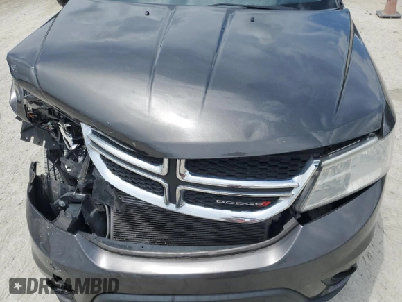 2017 Dodge Journey SXT z VIN 3C4PDCBG9HT515799, wystawiony jako Copart lot #62827975 z przebiegiem 156 215 mil mil oraz Szkoda całkowita • Salvage title. Historia ofert i sprzedaży dostępna na DreamBid. Obrazek 12.