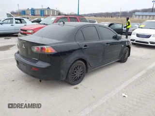 2010 Mitsubishi Lancer DE with VIN JA32U1FU2AU001270, listed as a IAAI auction lot 41567410 with 206,321 mi miles. Bid and sale history available at carsss.com. Image 4.