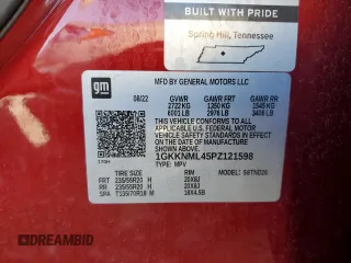 2023 GMC Acadia SLT z VIN 1GKKNML45PZ121598, wystawiony jako Copart lot #56511805 z przebiegiem 27 917 mil mil oraz Szkoda całkowita • Salvage title. Historia ofert i sprzedaży dostępna na DreamBid. Obrazek 13.