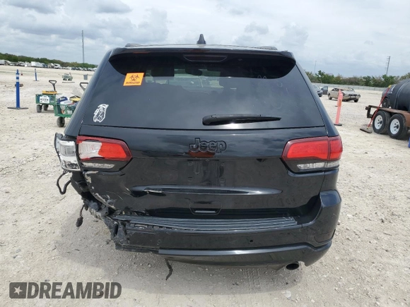 2018 Jeep Grand Cherokee Laredo E with VIN 1C4RJEAG4JC182430, listed as a Copart auction lot 50740255 with 117,944 mi miles and Salvage title. Bid and sale history available at DreamBid. Image 6.
