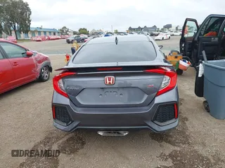2018 Honda Civic Si z VIN 2HGFC1E59JH710458, wystawiony jako IAAI lot #42147386 z przebiegiem 89 650 mil mil oraz . Historia ofert i sprzedaży dostępna na DreamBid. Obrazek 17.
