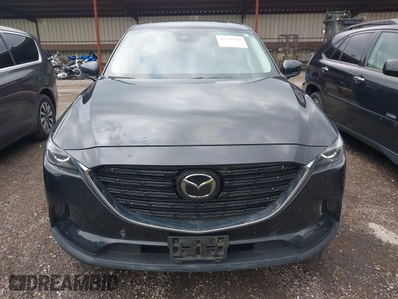 2023 Mazda CX-9 Touring Plus with VIN JM3TCBAY2P0657825, listed as a IAAI auction lot 42756562 with 52,090 mi miles and . Bid and sale history available at DreamBid. Image 12.