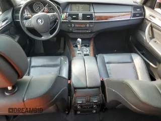 2012 BMW X5 35i z VIN 5UXZV4C56CL749152, wystawiony jako Copart lot #59525155 z przebiegiem 110 773 mil mil oraz Szkoda całkowita • Salvage title. Historia ofert i sprzedaży dostępna na DreamBid. Obrazek 8.