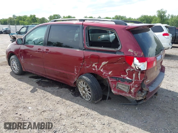 2008 Toyota Sienna XLE with VIN 5TDBK22C58S013745, listed as a IAAI auction lot 42565533 with 200,629 mi miles and . Bid and sale history available at DreamBid. Image 3.