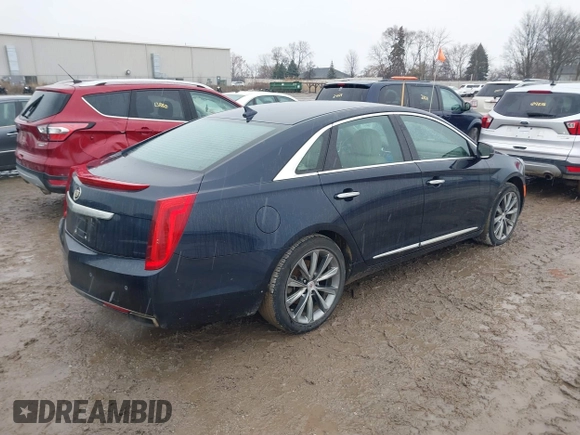 2013 Cadillac XTS Luxury with VIN 2G61P5S3XD9196239, listed as a IAAI auction lot 41205081 with 161,885 mi miles and . Bid and sale history available at carsss.com. Image 4.
