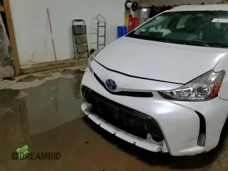 2016 Toyota Prius Two z VIN JTDZN3EU2GJ047489, wystawiony jako Copart lot #51177725 z przebiegiem 104 820 mil mil oraz Szkoda całkowita • Salvage title. Historia ofert i sprzedaży dostępna na DreamBid. Obrazek 13.