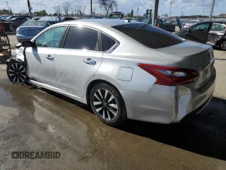 2018 Nissan Altima SV with VIN 1N4AL3AP8JC207041, listed as a Copart auction lot 51521575 with 127,482 mi miles and Salvage Title. Bid and sale history available at DreamBid. Image 2.