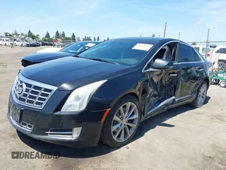 2013 Cadillac XTS Luxury z VIN 2G61R5S32D9226506, wystawiony jako IAAI lot #42208105 z przebiegiem 140 255 mil mil oraz . Historia ofert i sprzedaży dostępna na DreamBid. Obrazek 14.