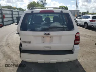 2011 Ford Escape XLS with VIN 1FMCU9C71BKC08406, listed as a Copart auction lot 61359975 with 182,954 mi miles and Salvage title. Bid and sale history available at DreamBid. Image 6.