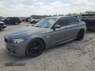 2016 BMW 5 Series 535i with VIN WBA5B1C5XGG130007, listed as a Copart auction lot 52827335 with 118,708 mi miles and Salvage title. Bid and sale history available at DreamBid. Image 1.