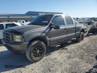 2003 Ford Super Duty F-250 XL with VIN 1FTNW21F63EA21929, listed as a Copart auction lot 69227744 with 314,556 mi miles and Salvage Title. Bid and sale history available at carsss.com. Image 1.