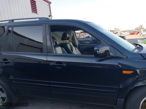 2006 Honda Pilot EX-L with RES with VIN 5FNYF28616B029670, listed as a IAAI auction lot 41425494 with 206,756 mi miles. Bid and sale history available at carsss.com. Image 13.