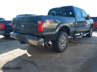 2015 Ford Super Duty F-250 SRW Lariat with VIN 1FT7W2BT6FEB68835, listed as a IAAI auction lot 41970738 with 376,238 mi miles. Bid and sale history available at carsss.com. Image 4.