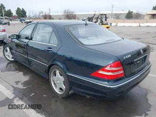 2001 Mercedes-Benz S with VIN WDBNG75J01A152091, listed as a IAAI auction lot 38561077 with 84,669 mi miles. Bid and sale history available at carsss.com. Image 3.