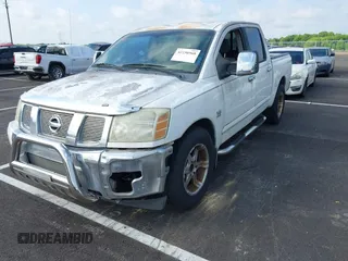 2004 Nissan Titan LE with VIN 1N6AA07A34N517511, listed as a IAAI auction lot 42250560 with 122,189 mi miles and . Bid and sale history available at DreamBid. Image 2.