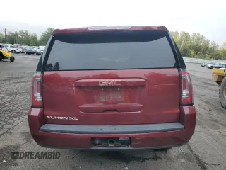 2019 GMC Yukon XL SLT with VIN 1GKS2GKC6KR341781, listed as a Copart auction lot 77468734 with 93,482 mi miles and Salvage Title. Bid and sale history available at DreamBid. Image 6.