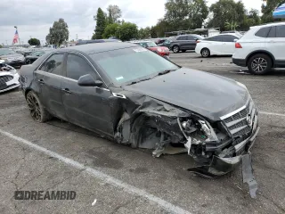 2011 Cadillac CTS with VIN 1G6DA5EY7B0132575, listed as a Copart auction lot 72469184 with 124,370 mi miles and Salvage Title. Bid and sale history available at DreamBid. Image 4.