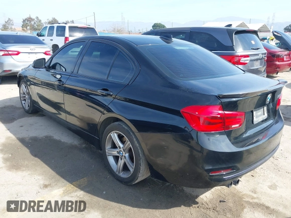 2016 BMW 3 Series 328i with VIN WBA8E9C58GK645880, listed as a IAAI auction lot 41601272 with 163,579 mi miles and . Bid and sale history available at DreamBid. Image 3.