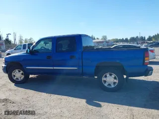 2004 GMC Sierra 1500 Crew Cab SLE with VIN 2GTEK13TX41394077, listed as a IAAI auction lot 42047304 with 227,296 mi miles. Bid and sale history available at carsss.com. Image 14.