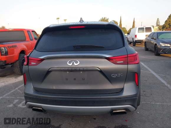2021 Infiniti QX50 Luxe with VIN 3PCAJ5BA9MF124179, listed as a IAAI auction lot 42296244 with 79,935 mi miles and . Bid and sale history available at DreamBid. Image 16.