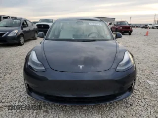 2022 Tesla Model 3 Long Range with VIN 5YJ3E1EB0NF269249, listed as a Copart auction lot 87318524 with 18,406 mi miles and Salvage Title. Bid and sale history available at DreamBid. Image 5.