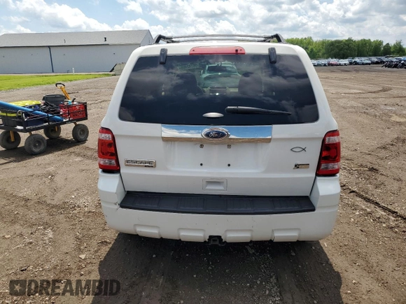 2012 Ford Escape Limited z VIN 1FMCU0EG5CKC78503, wystawiony jako Copart lot #56742405 z przebiegiem 138 324 mil mil oraz Szkoda całkowita • Salvage title. Historia ofert i sprzedaży dostępna na DreamBid. Obrazek 6.
