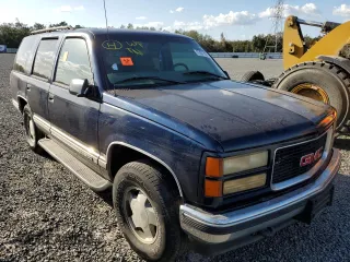 1998 GMC Yukon with VIN 1GKEK13R6WJ706204, listed as a Copart auction lot 77577074 with 186,023 mi miles and Salvage Title. Bid and sale history available at carsss.com. Image 4.