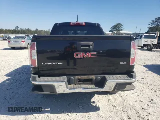 2015 GMC Canyon 2WD SLE with VIN 1GTG5BEA6F1221120, listed as a Copart auction lot 77391484 with 180,334 mi miles and Salvage Title. Bid and sale history available at carsss.com. Image 6.