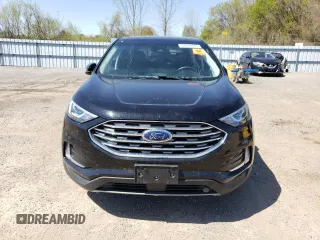 2020 Ford Edge SEL с VIN 2FMPK3J9XLBA38020, выставлен на аукционе Copart как лот 56423945 с пробегом 76 033 миль миль и Чистый • Clean title. История ставок и продаж доступна на DreamBid. Изображение 5.