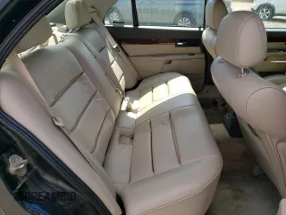 2000 Cadillac Catera z VIN W06VR54R0YR011736, wystawiony jako Copart lot #54927395 z przebiegiem 45 892 mil mil oraz Szkoda całkowita • Salvage title. Historia ofert i sprzedaży dostępna na DreamBid. Obrazek 10.