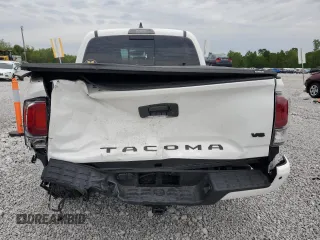 2023 Toyota Tacoma SR z VIN 3TMCZ5AN2PM583382, wystawiony jako Copart lot #58209775 z przebiegiem 17 442 mil mil oraz Szkoda całkowita • Salvage title. Historia ofert i sprzedaży dostępna na DreamBid. Obrazek 6.
