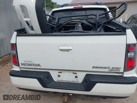 2013 Honda Ridgeline RTL with VIN 5FPYK1F58DB018542, listed as a IAAI auction lot 42465817 with 112,898 mi miles and . Bid and sale history available at DreamBid. Image 17.