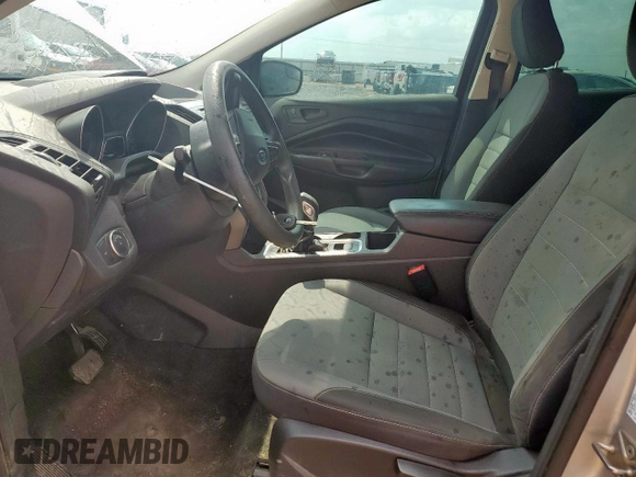 2018 Ford Escape S z VIN 1FMCU0F73JUD50086, wystawiony jako Copart lot #65004825 z przebiegiem Nie podano mil oraz Szkoda całkowita • Salvage title. Historia ofert i sprzedaży dostępna na DreamBid. Obrazek 7.