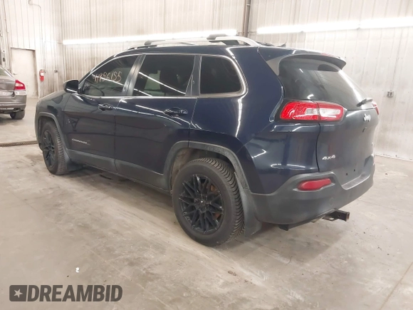 2014 Jeep Cherokee Latitude with VIN 1C4PJMCS9EW190255, listed as a IAAI auction lot 41956155 with 220,265 mi miles. Bid and sale history available at carsss.com. Image 3.