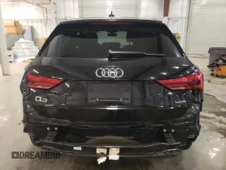 2019 Audi Q3 Premium z VIN WA1AECF38K1076064, wystawiony jako Copart lot #56731715 z przebiegiem 97 532 mil mil oraz Szkoda całkowita • Salvage title. Historia ofert i sprzedaży dostępna na DreamBid. Obrazek 6.