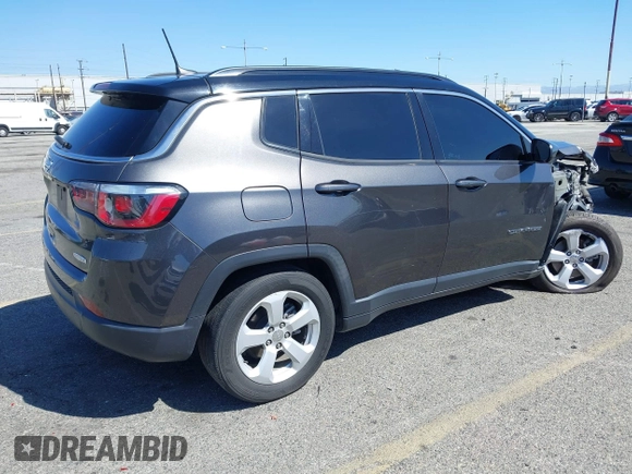 2020 Jeep Compass Altitude with VIN 3C4NJCBB0LT134047, listed as a IAAI auction lot 41806348 with 70,533 mi miles and . Bid and sale history available at carsss.com. Image 4.