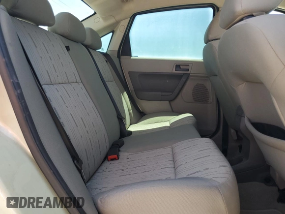 2010 Ford Focus SE with VIN 1FAHP3FN1AW227852, listed as a Copart auction lot 56392435 with 145,047 mi miles and Salvage Title. Bid and sale history available at DreamBid. Image 10.