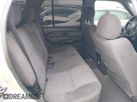 2003 Nissan Pathfinder LE z VIN JN8DR09Y03W800643, wystawiony jako IAAI lot #42373234 z przebiegiem 214 389 mil mil oraz . Historia ofert i sprzedaży dostępna na DreamBid. Obrazek 8.