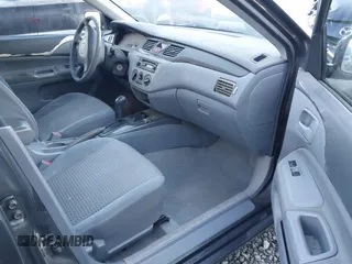 2003 Mitsubishi Lancer ES with VIN JA3AJ26E83U006060, listed as a IAAI auction lot 41254660 with 220,490 mi miles. Bid and sale history available at carsss.com. Image 5.