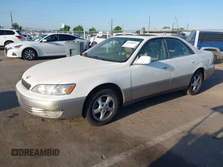 1997 Lexus ES 300 z VIN JT8BF22G5V0060245, wystawiony jako IAAI lot #42368851 z przebiegiem 241 736 mil mil oraz . Historia ofert i sprzedaży dostępna na DreamBid. Obrazek 2.